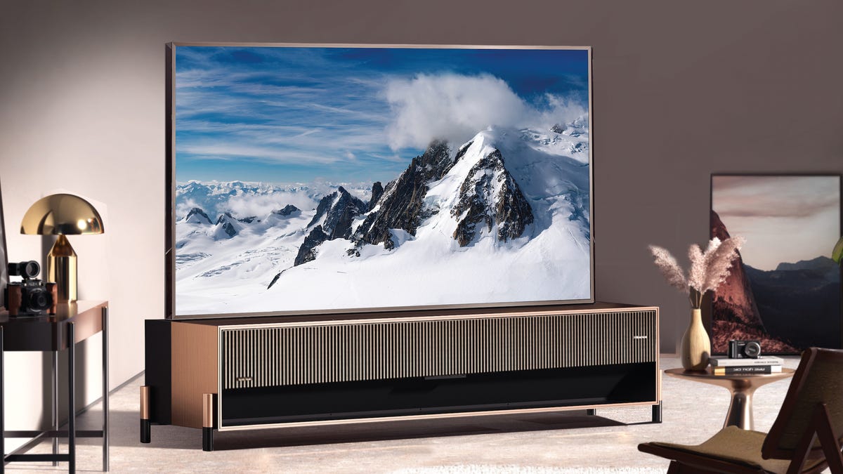 The 110-inch Hisense UX on a stand.