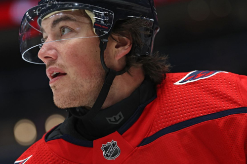 WASHINGTON, DC - NOVEMBER 04: T.J. Oshie #77 of the Washington Capitals wears a neck guard as he skates before playing against the Columbus Blue Jackets at Capital One Arena on November 04, 2023 in Washington, DC. (Photo by Patrick Smith/Getty Images)