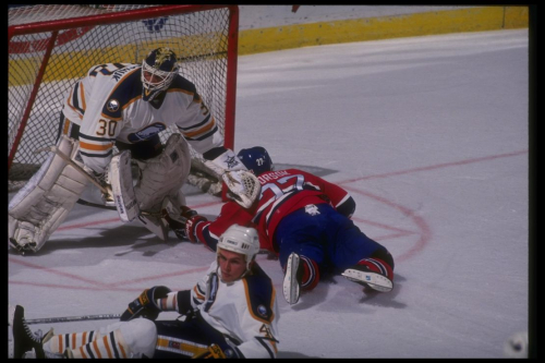 1990-1991:  Goaltender Clint Malarchuk of the Buffalo Sabres tends goal during a game against the Montreal Canadiens at Memorial Auditorium in Buffalo, New York. Mandatory Credit: Rick Stewart  /Allsport