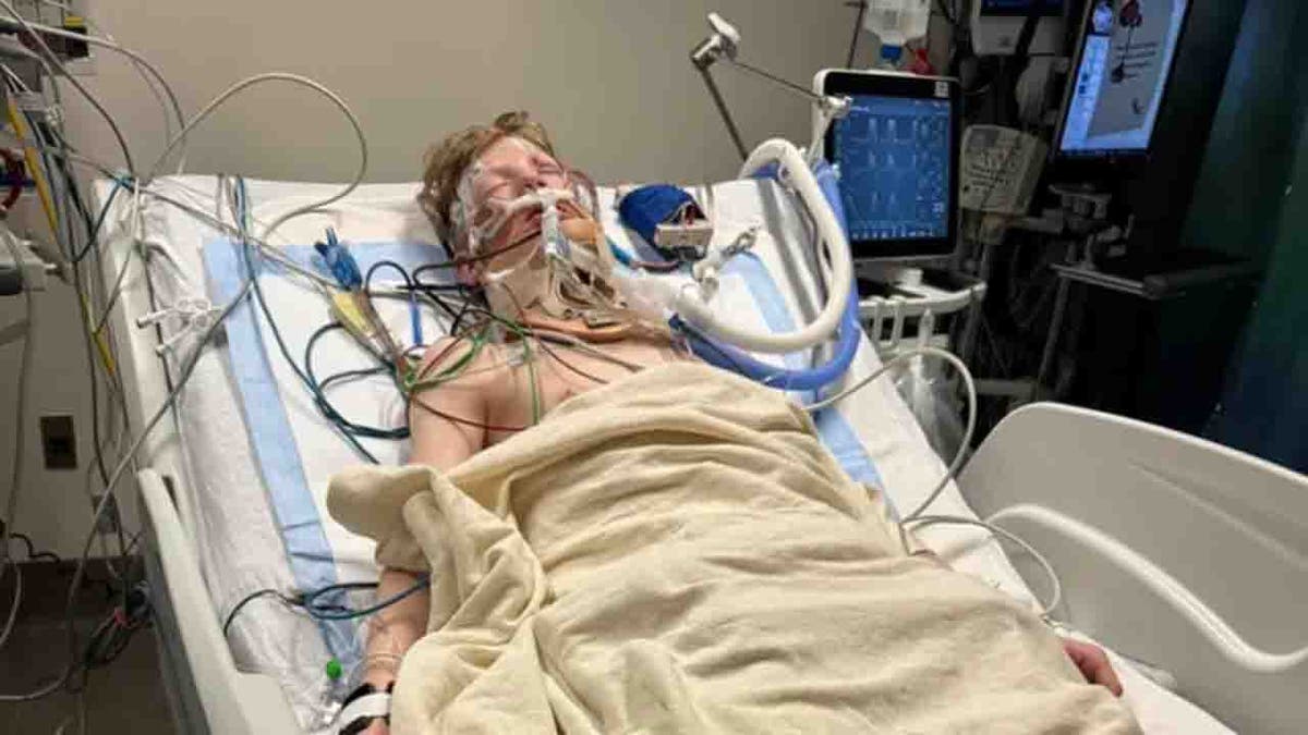 Adam McWherter in hospital bed
