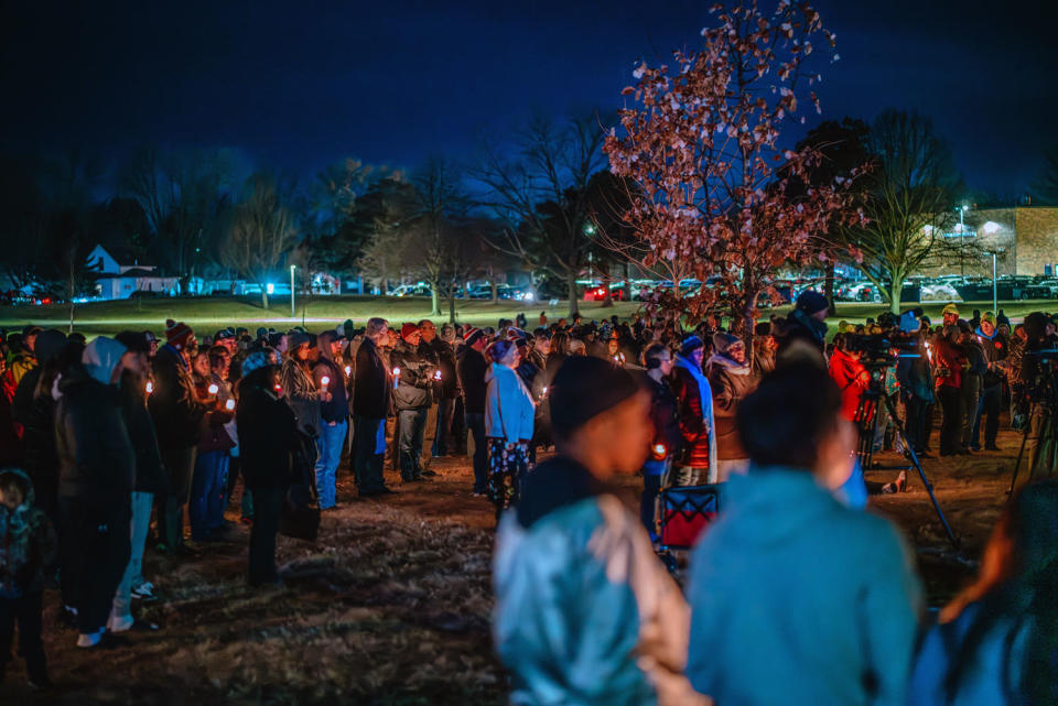 Community members gather Thursday at a candlelight vigil at Wiese Park to reflect on and mourn the shooting at the Perry Middle School and High School complex in Perry, Iowa.  (Jamie Kelter Davis for NBC News / Jamie Kelter Davis)