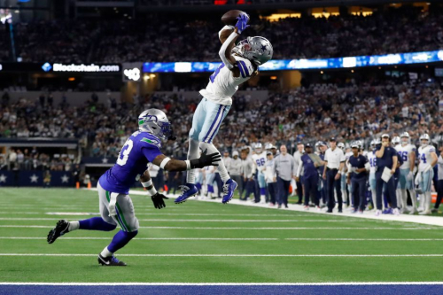 Dallas Cowboys wide receiver Brandin Cooks catches a pass for a first down as Seattle Seahawks safety Jamal Adams defends during the Cowboys' 41-35 Thursday Night Football win on November 30.