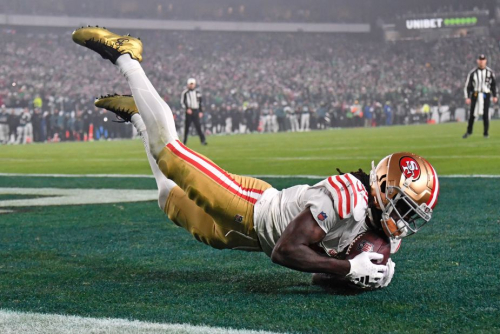 San Francisco 49ers wide receiver Brandon Aiyuk a catches touchdown pass in the end zone.