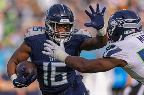 Tennessee Titans wide receiver Treylon Burks runs for yardage during the Titans' 20-17 loss to the Seattle Seahawks.