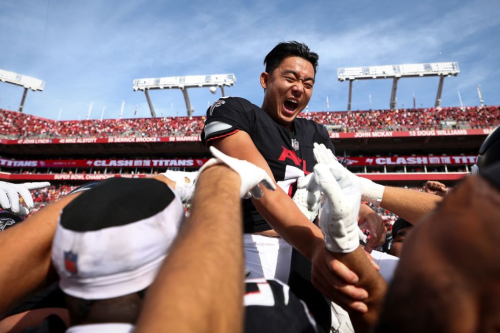 Atlanta Falcons placekicker Younghoe Koo celebrates with teammates after making a game-winning field goal on the final play of the Falcons' 16-13 victory over the Tampa Bay Buccaneers. 