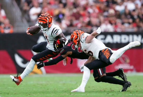Cincinnati Bengals wide receiver Ja'Marr Chase runs past Arizona Cardinals cornerback Marco Wilson after making a catch during the Bengals' 34-20 victory over the Cardinals. Chase scored three touchdowns during the game.