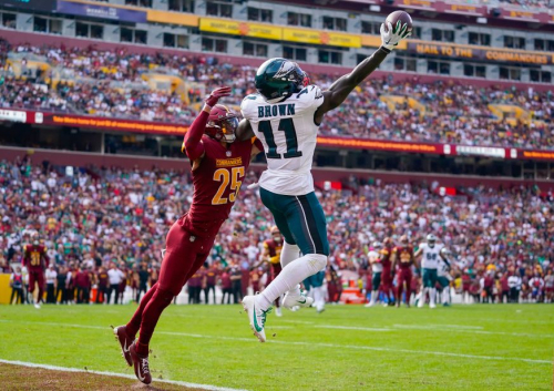 Philadelphia Eagles wide receiver A.J. Brown makes a one-handed catch to score a touchdown against Washington Commanders cornerback Benjamin St-Juste. The Eagles beat the Commanders 38-31.