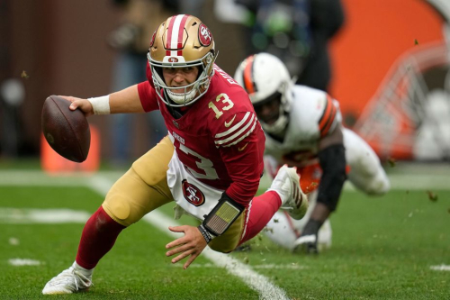 San Francisco 49ers quarterback Brock Purdy scrambles away from Cleveland Browns linebacker Jeremiah Owusu-Koramoah during the second half of the 49ers' 19-17 loss on October 15.