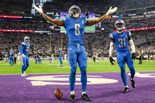 Detroit Lions safety Ifeatu Melifonwu celebrates after he intercepted a pass during the Lions' 30-24 victory over the Minnesota Vikings on Sunday, December 24. The Lions secured their fist division title since 1993 with the win.