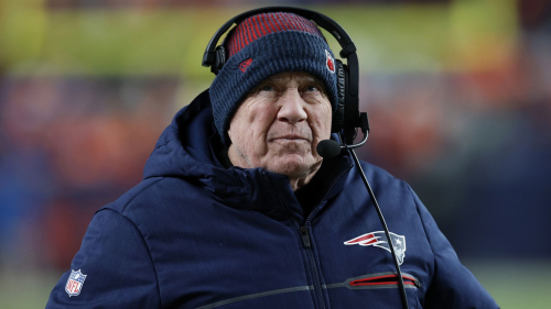 Denver, CO - December 24: New England Patriots head coach Bill Belichick walks the sidelines. The Patriots beat the Denver Broncos, 26-23. (Photo by Danielle Parhizkaran/The Boston Globe via Getty Images)