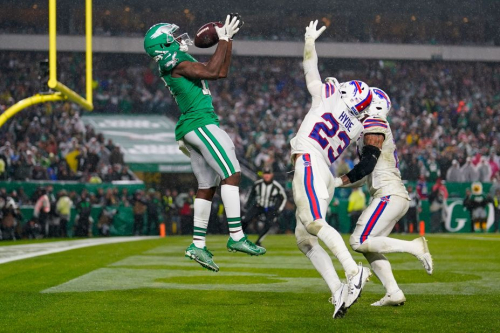 Philadelphia Eagles wide receiver Olamide Zaccheaus catches a touchdown pass over Buffalo Bills safety Micah Hyde.