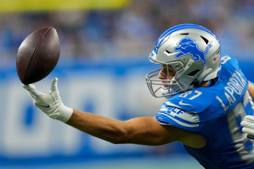 Detroit Lions tight end Sam LaPorta tries in vain to pull in a pass reception in Detroit on October 8. The Lions beat the Carolina Panthers 42-24.