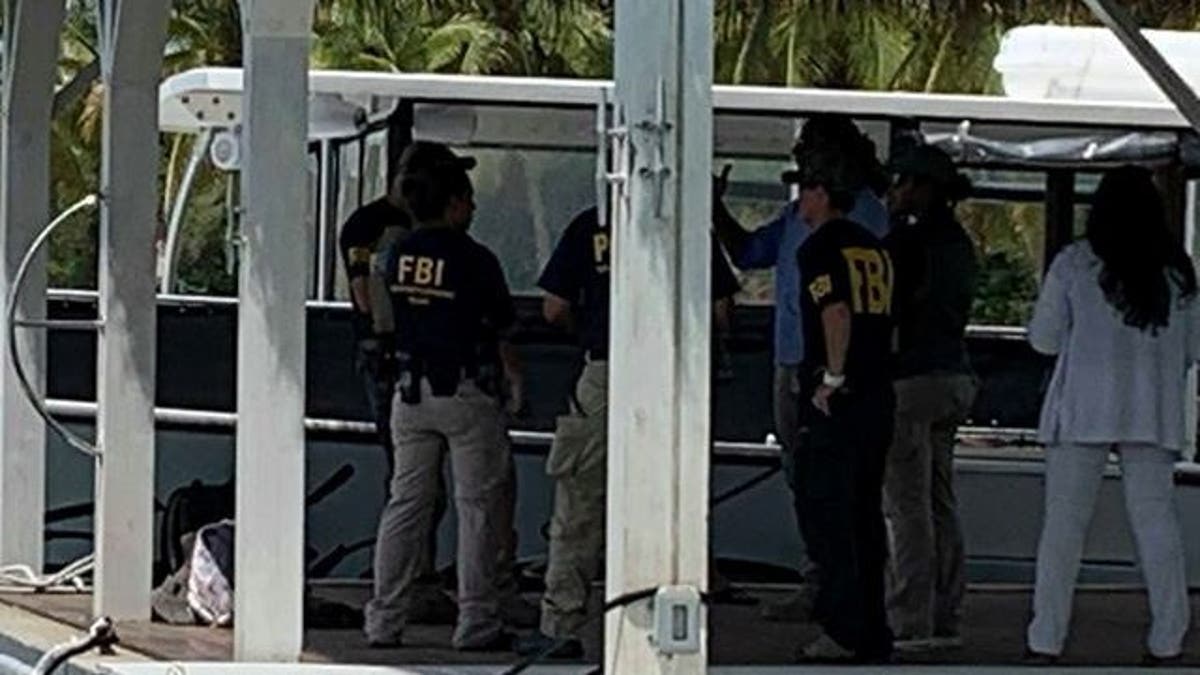 FBI agents are seen at Little St. James Island, one of the properties of late financier Jeffrey Epstein, in U.S. Virgin Islands