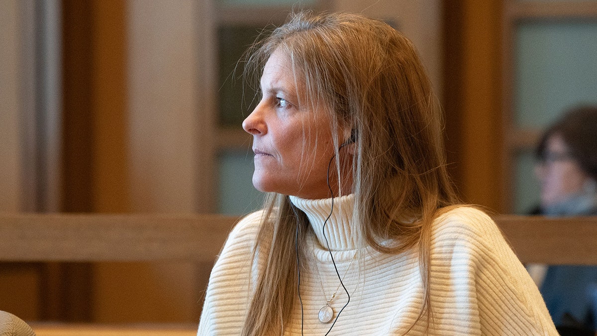 Michelle Troconis listens to testimony during the second day of her trial