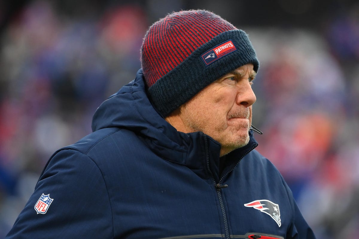 Head coach Bill Belichick of the New England Patriots wearing a winter cap.