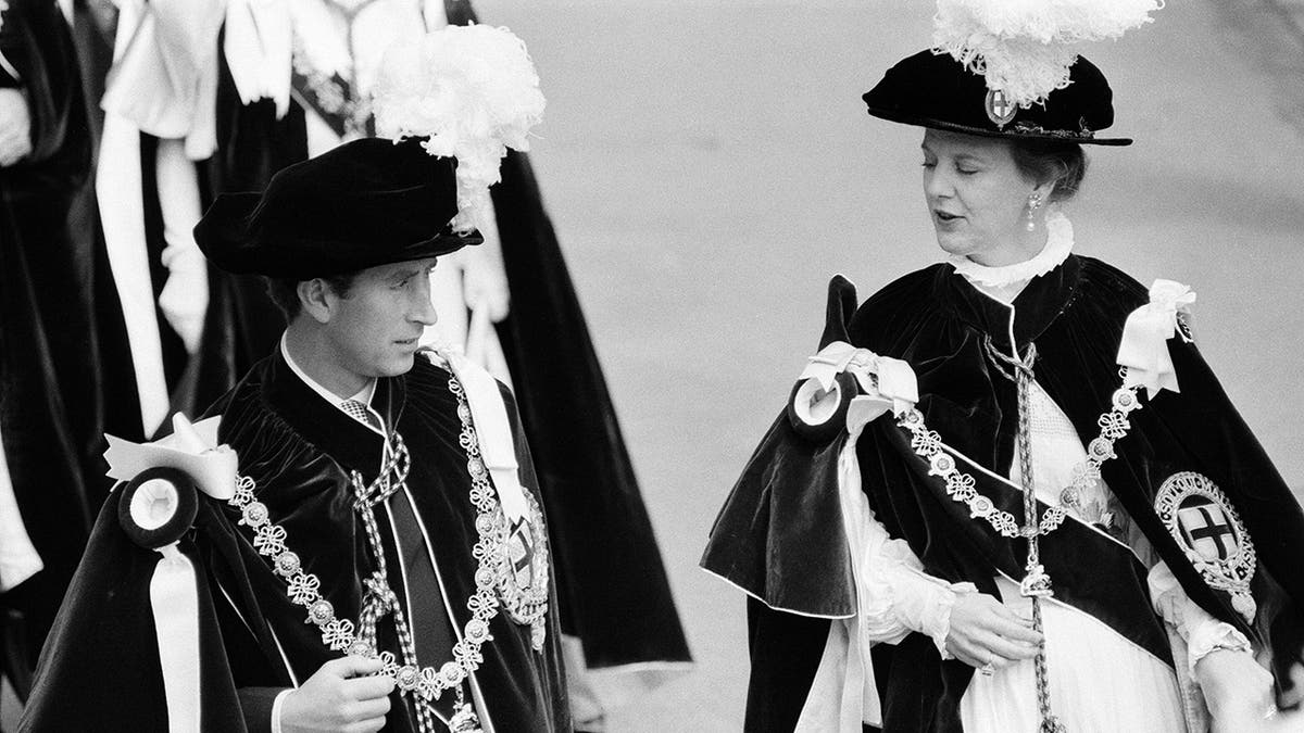 A young Prince Charles and Queen Margrethe in royal robes