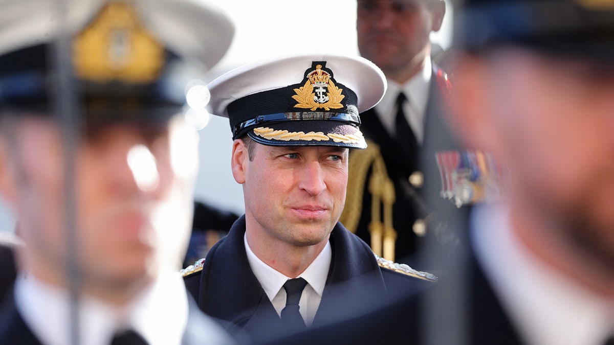 A close-up of Prince William in a naval uniform