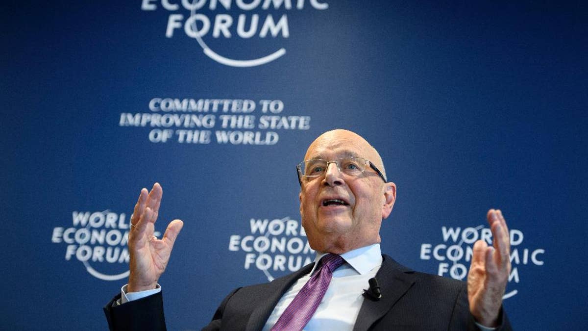 German Klaus Schwab, founder and president of the World Economic Forum, WEF, gestures during a press conference, in Cologny near Geneva, Switzerland, Tuesday, Jan. 10, 2017. The World Economic Forum unveiled the program for its annual meeting in Davos, Switzerland, including the key participants, themes and goals. The overarching theme of the meeting, which will take place from Jan. 17 to 20, is "Responsive and Responsible Leadership". (Laurent Gillieron/Keystone via AP)