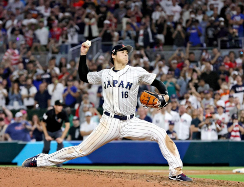 Shohei Ohtani of Japan throws a ball during the World Baseball Classic final match against United States at LoanDepot Park in Miami, Florida, United States on March 21, 2023.