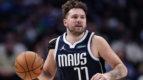 DALLAS, TEXAS - JANUARY 03: Luka Doncic #77 of the Dallas Mavericks brings the ball up court during the second half against the Portland Trail Blazers at American Airlines Center on January 03, 2024 in Dallas, Texas. NOTE TO USER: User expressly acknowledges and agrees that, by downloading and or using this photograph, User is consenting to the terms and conditions of the Getty Images License Agreement. (Photo by Sam Hodde/Getty Images)