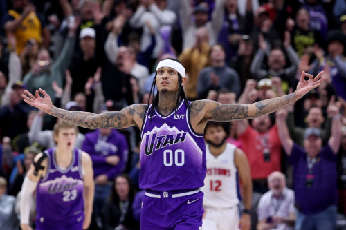 Jan 3, 2024; Salt Lake City, Utah, USA; Utah Jazz guard Jordan Clarkson (00) reacts to making a three point shot in the last seconds of the game against the Detroit Pistons at Delta Center. Mandatory Credit: Rob Gray-USA TODAY Sports