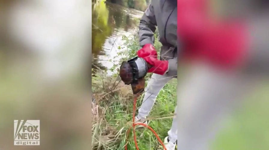 Two men find untouched grenade while magnet fishing