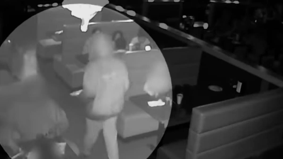 Surveillance footage showing suspect walking