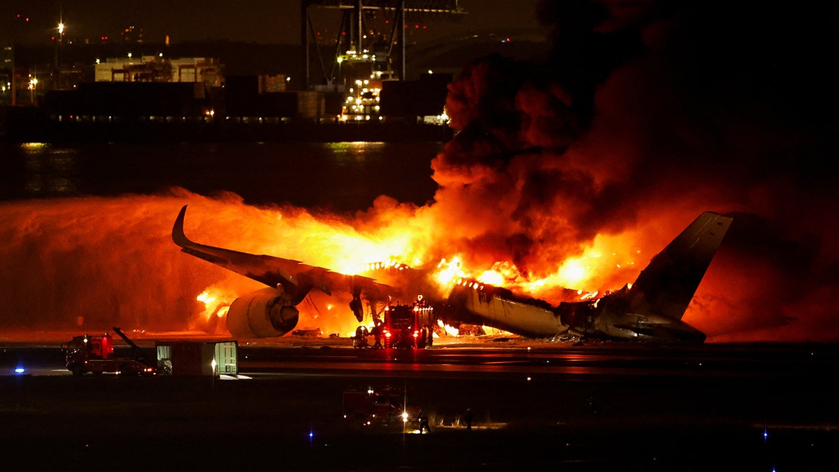 Plane on fire, emergency response crews