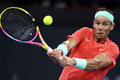 BRISBANE, AUSTRALIA - JANUARY 05: Rafael Nadal of Spain plays a backhand in his match against Jordan Thompson of Australia  during day six of the  2024 Brisbane International at Queensland Tennis Centre on January 05, 2024 in Brisbane, Australia. (Photo by Chris Hyde/Getty Images)