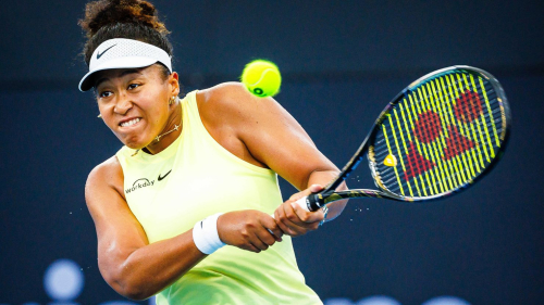 Naomi Osaka of Japan hits a return during her women's singles match against Karolina Pliskova of the Czech Republic at the Brisbane International tennis tournament in Brisbane on January 3, 2024. (Photo by Patrick HAMILTON / AFP) / --IMAGE RESTRICTED TO EDITORIAL USE - STRICTLY NO COMMERCIAL USE-- (Photo by PATRICK HAMILTON/AFP via Getty Images)