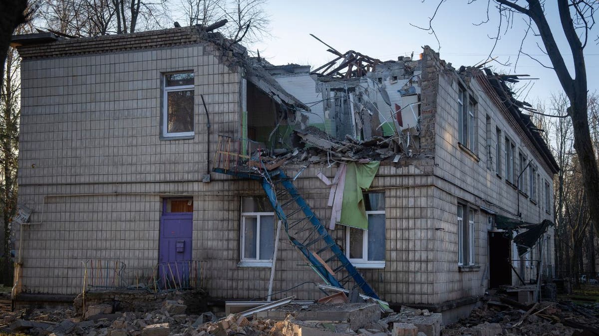 A A damaged kindergarten following a Russian drone attack