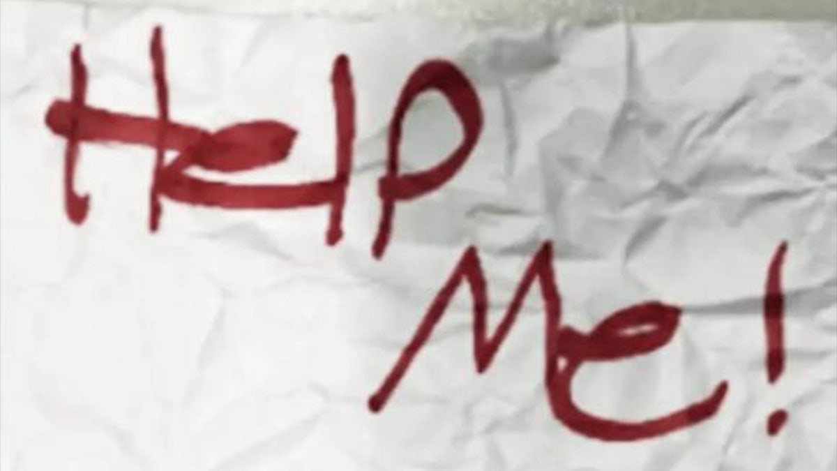 'Help Me' sign