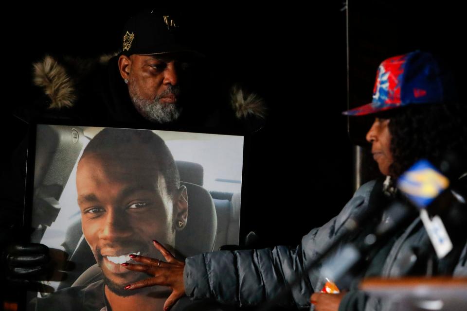 Rodney Wells, the father of Tyre Nichols, holds a picture of Nichols as RowVaughn Wells, Nichols’ mother, touches his face during a candlelight vigil for Nichols held at the site where he was beaten to death by Memphis Police Department officers on the one year anniversary of his death in Memphis, Tenn., on Sunday, January 7, 2024.