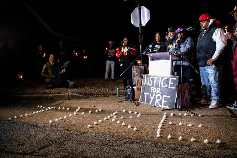 RowVaughn Wells, the mother of Tyre Nichols, speaks about her son surrounded by her family as candles spelling out “Tyre” can be seen in front of her during a candlelight vigil for Nichols held at the site where he was beaten to death by Memphis Police Department officers on the one year anniversary of his death in Memphis, Tenn., on Sunday, January 7, 2024.