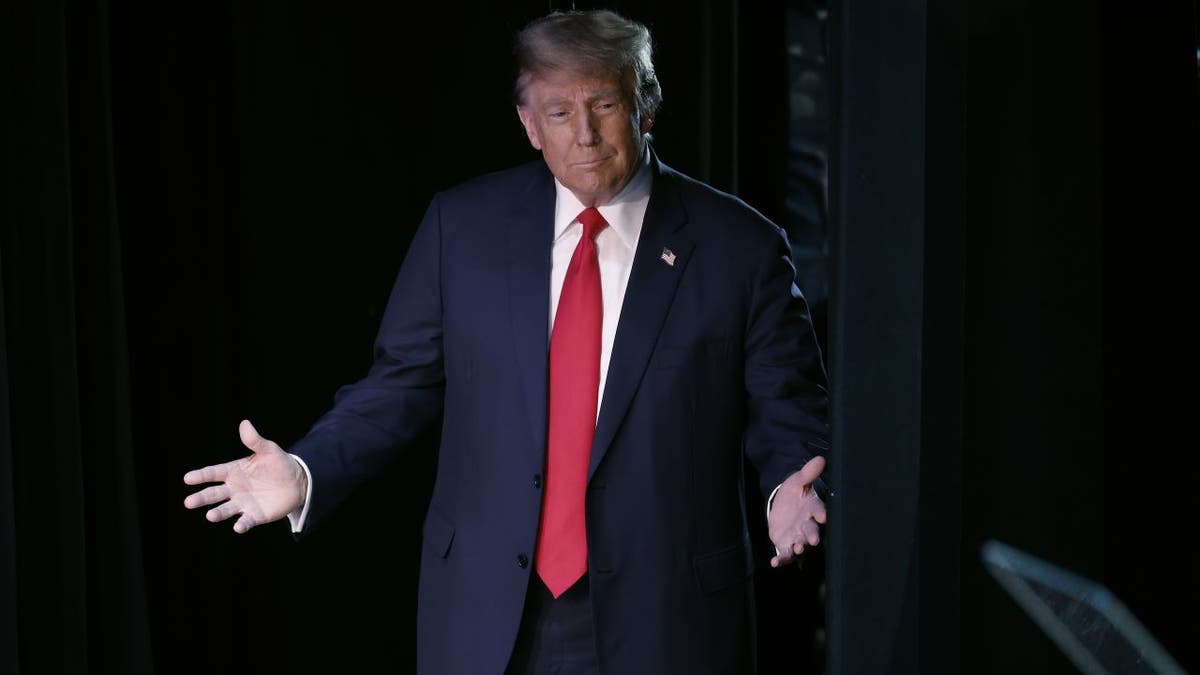 Trump gesturing before taking stage