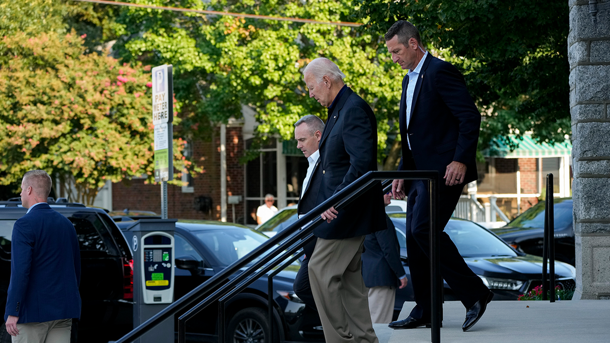 Biden leaving Mass