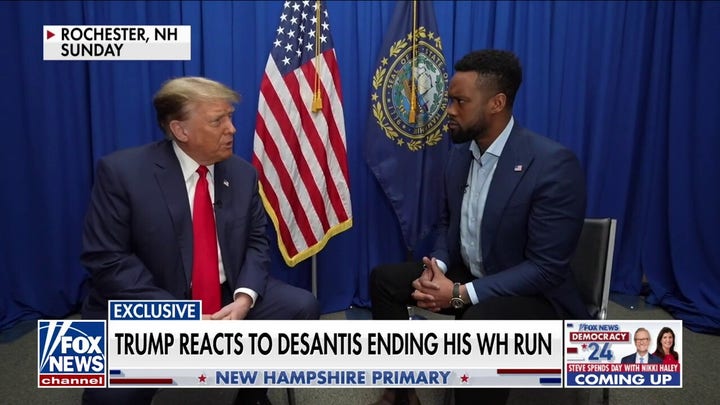 Trump speaks with Lawrence Jones after Ron DeSantis drops out of the race