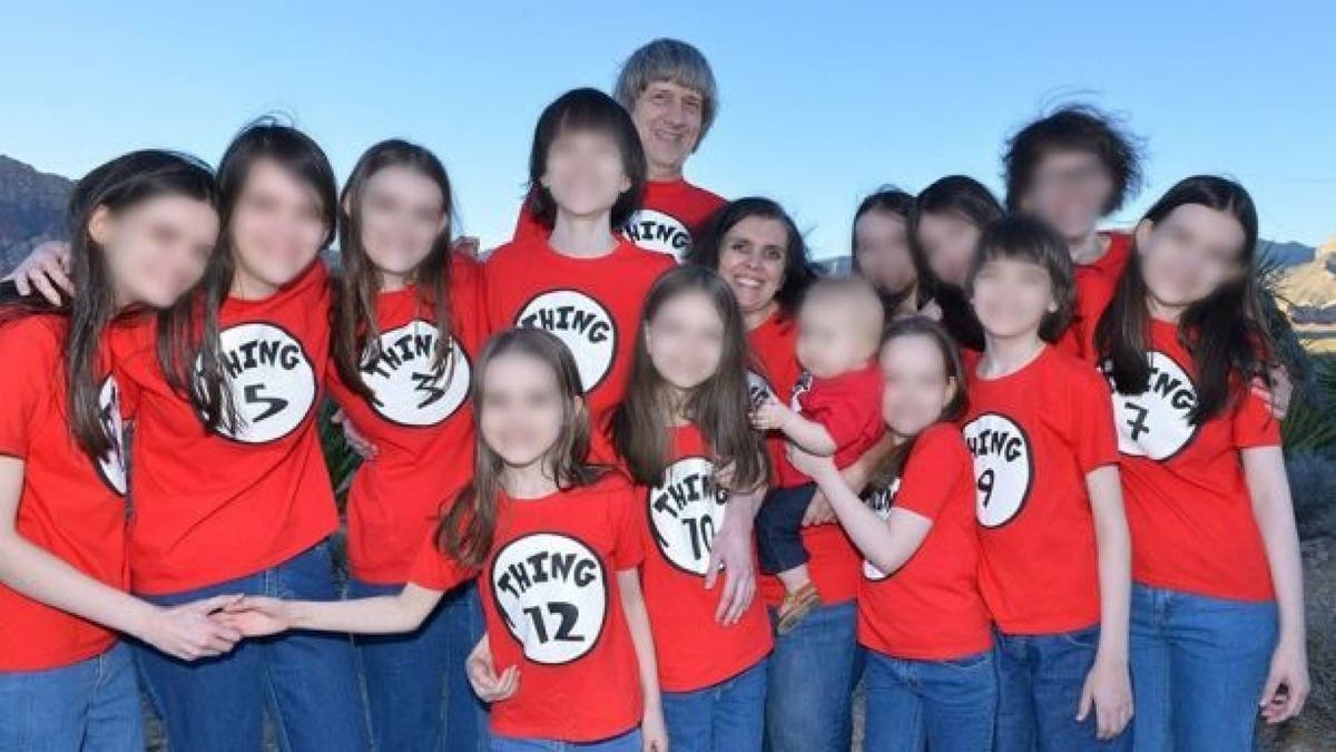 David and Louise Turpin are pictured with their 13 children in April 2016.