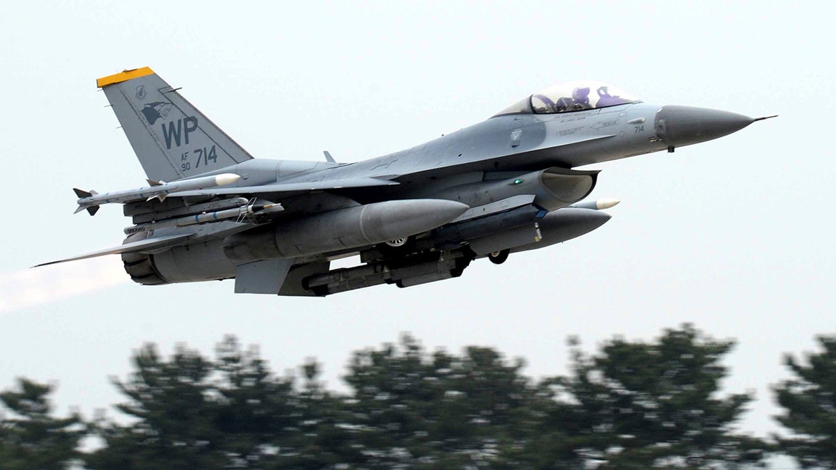 F-16 fighter jet taking flight