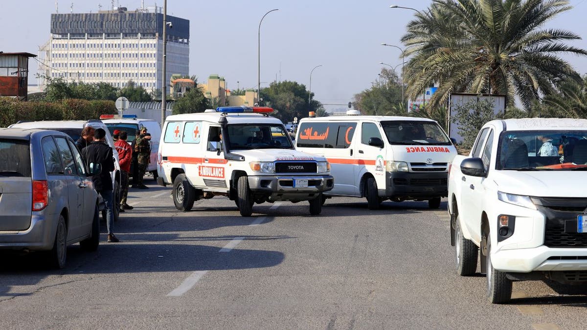 Several ambulances arrive to the site where Al-Nujaba senior commander Abu Taqwa Al-Saidi was killed