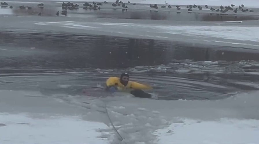Utah firefighter saves dog stuck in icy pond
