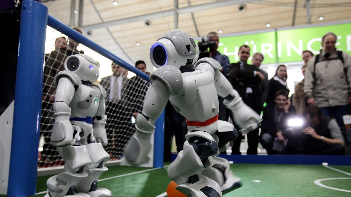 AI robots playing soccer in a demonstration