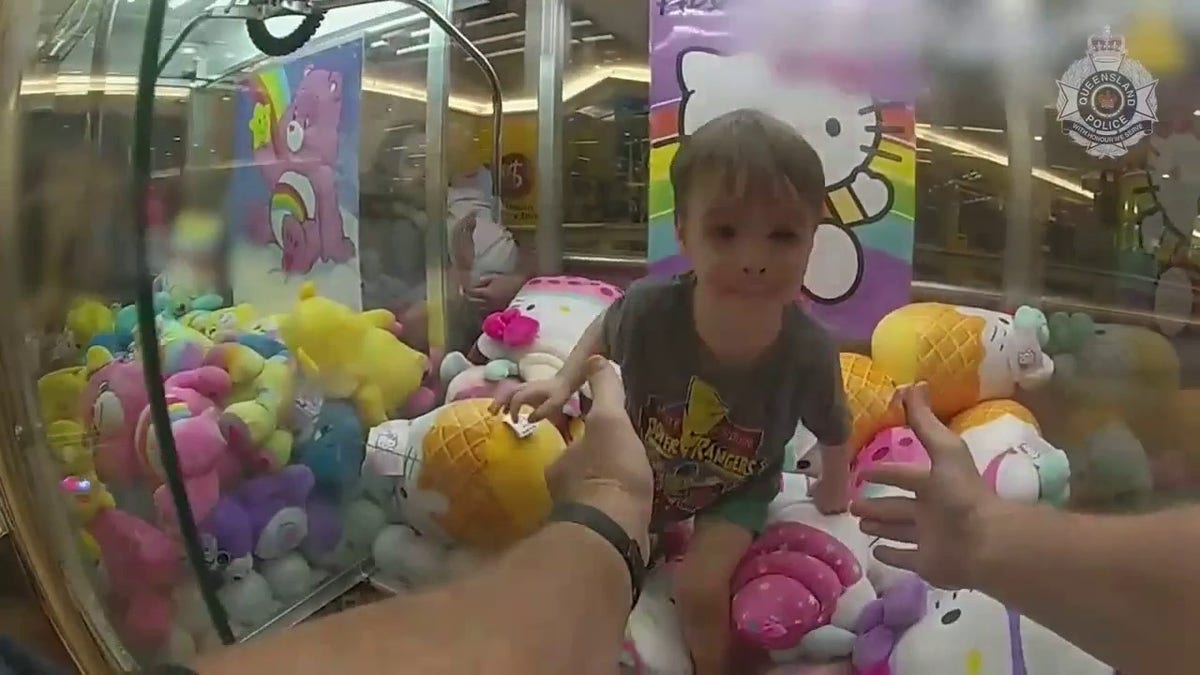 police rescue toddler stuck inside claw machine