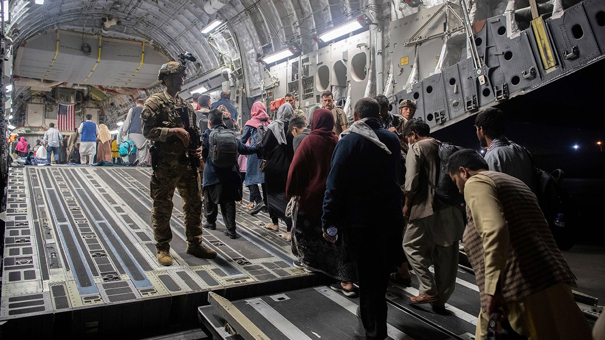 Afghan passengers during evacuation
