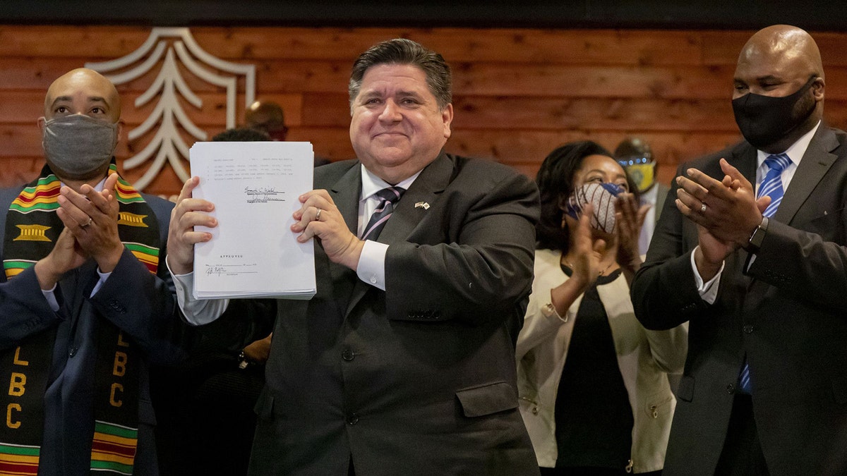 Gov. Pritzker and Rep. Slaughter