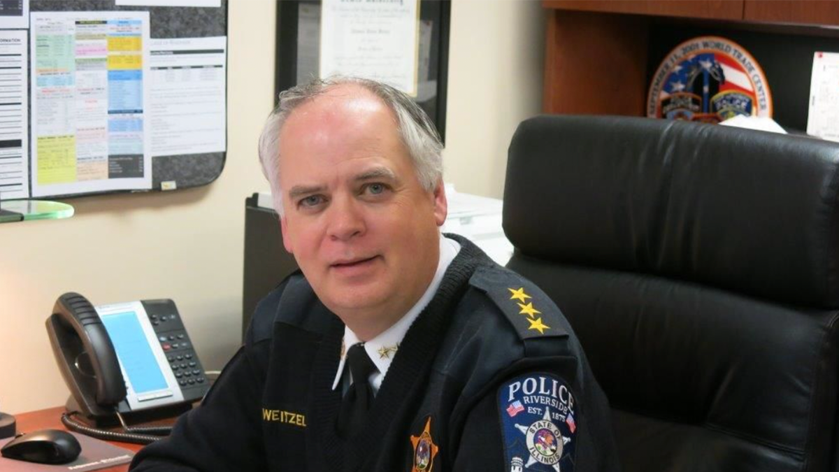 Illinois police chief at desk