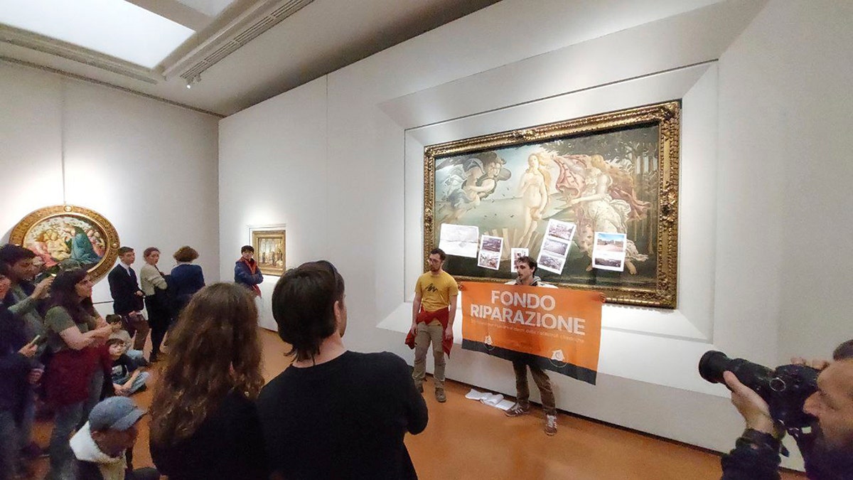 Activists attach protest materials to Botticelli’s 