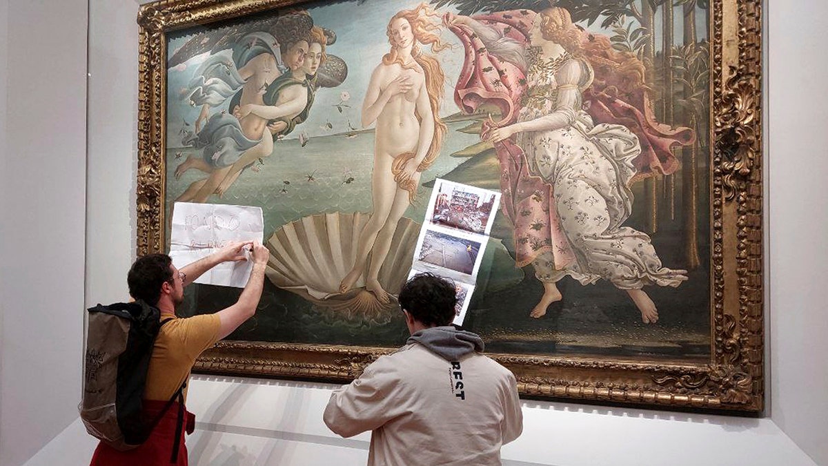 Activists attach protest materials to Botticelli’s 