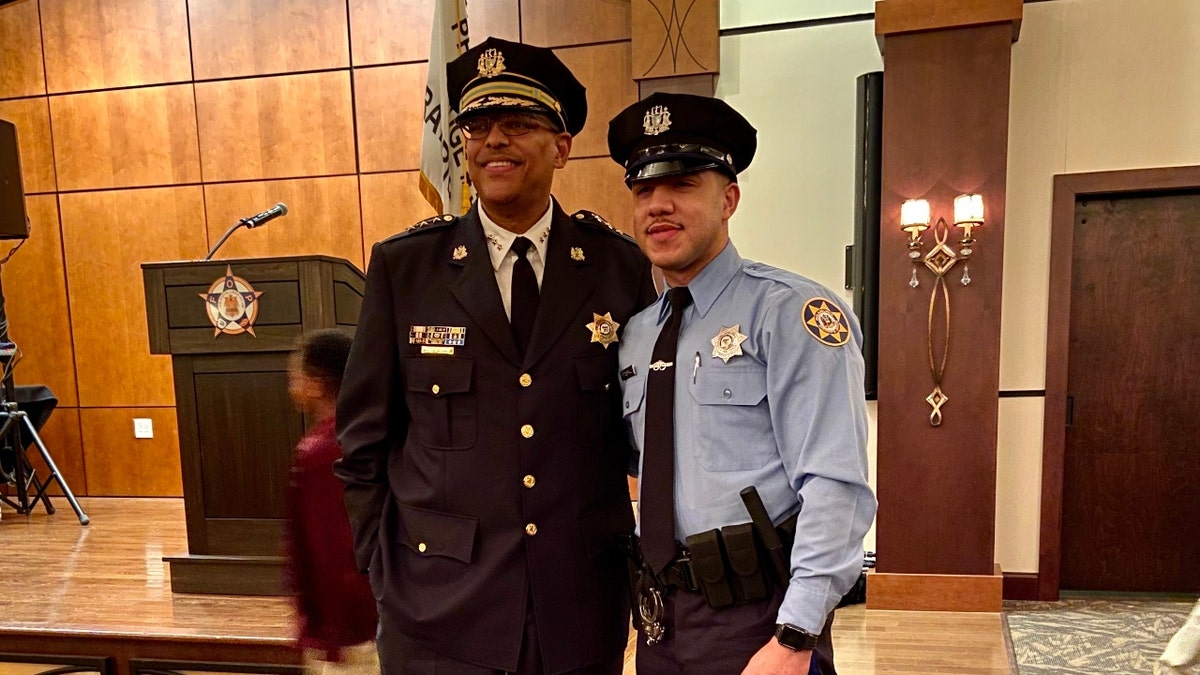 Slain Temple University Officer Christopher Fitzgerald is pictured with his father, Joel Fitzgerald Sr., former police chief of Waterloo, Iowa.