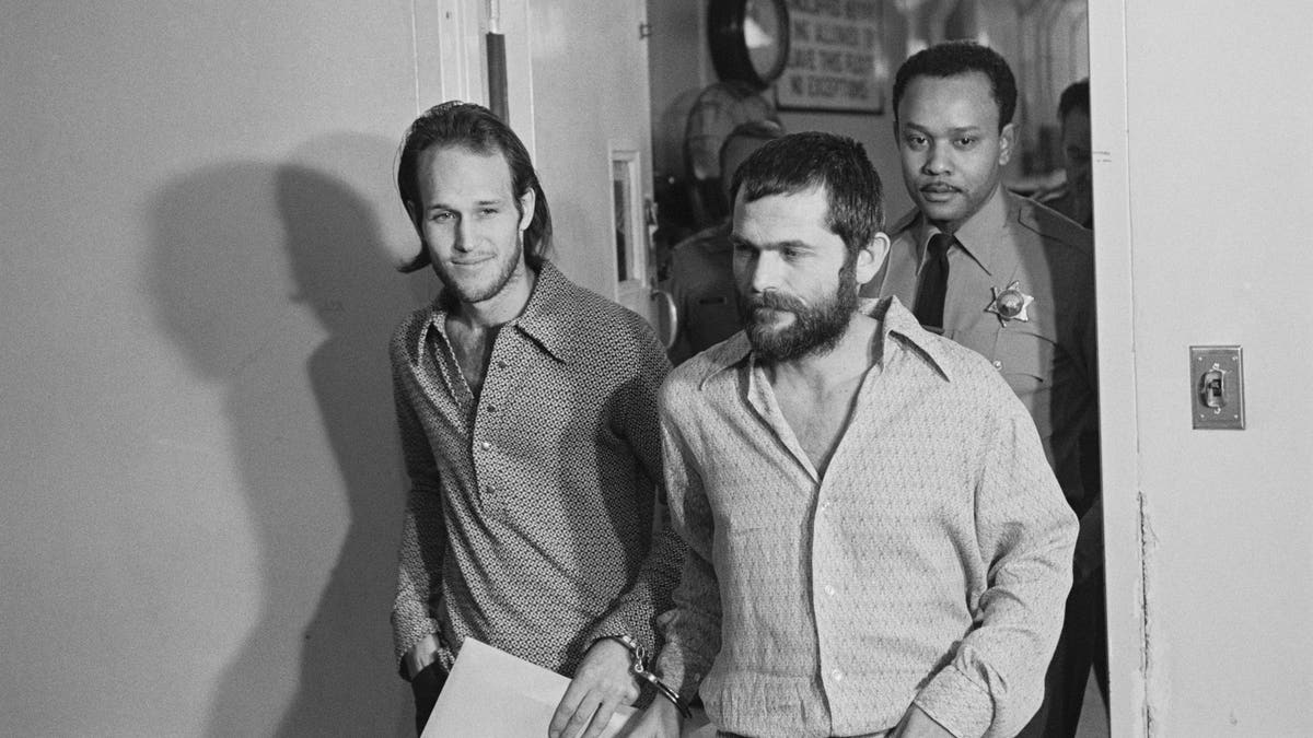 Bruce Davis and Steve Grogan Handcuffed